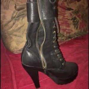 Leather lace heel boot.